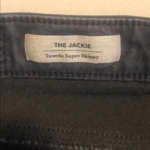 AG faded black tuxedo skinny jeans